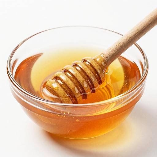 Golden Honey in Clear Glass Bowl