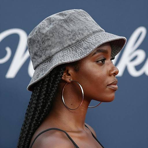 Stylish Black Woman in Bucket Hat