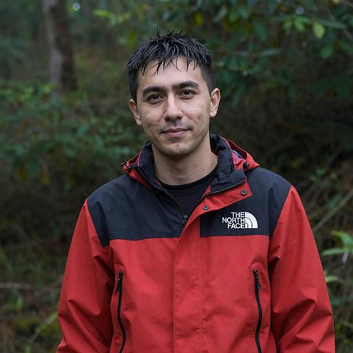 Smiling Man in Red North Face Jacket