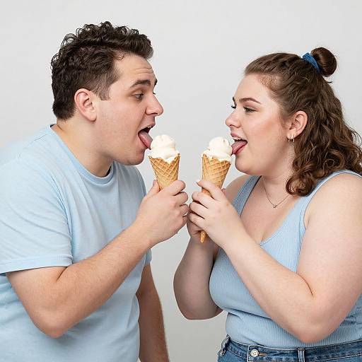 Playful Couple Sharing Ice Cream