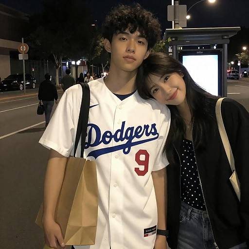 Young Couple Embracing Under Night Sky