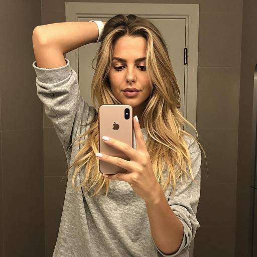 Casual Bathroom Selfie of Blonde Woman