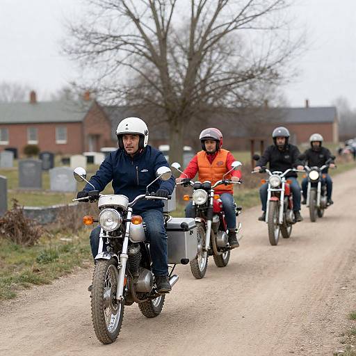 Dynamic Dirt Ride: Four Motorcyclists in Action