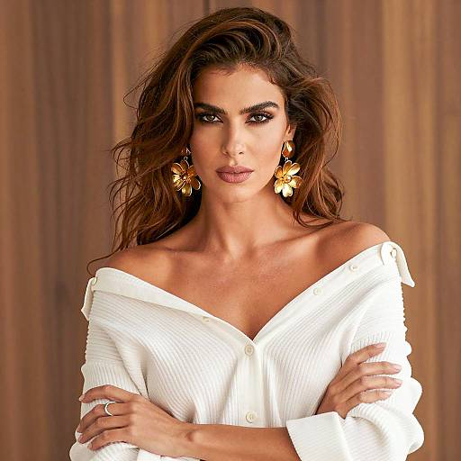 Woman with Long Wavy Hair and Gold Earrings