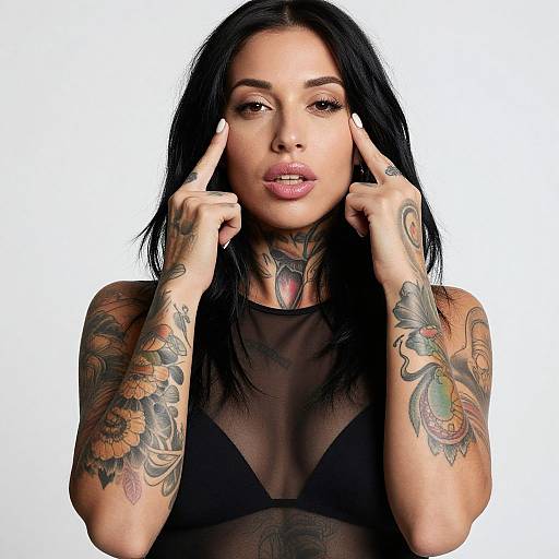 Tattooed Woman in Sheer Black Top