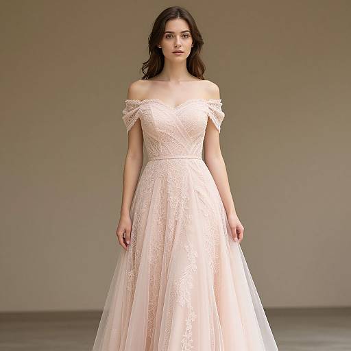 Photograph of a young woman with long dark hair, wearing an off-the-shoulder, lace-embellished, pale pink ball gown,