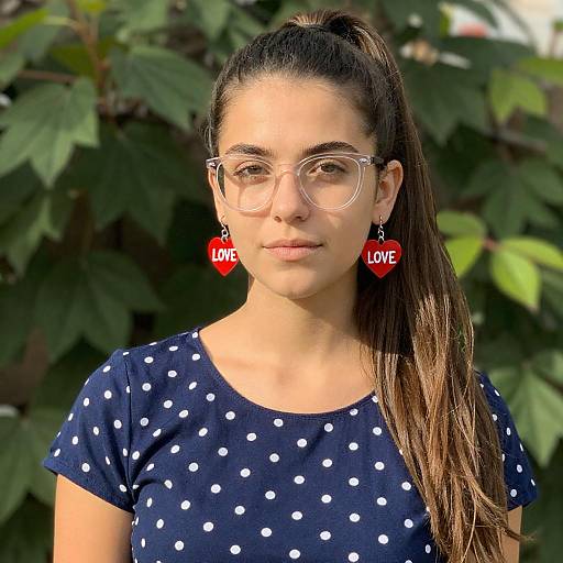 Young Woman in Sunglasses in Garden