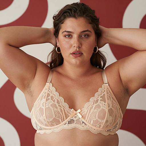 Plus-Sized Woman in Beige Lace Bra with Raised Arms
