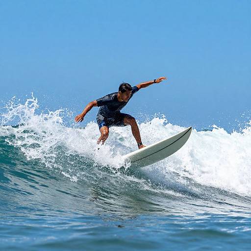 Surfer Gliding on Cresting Wave