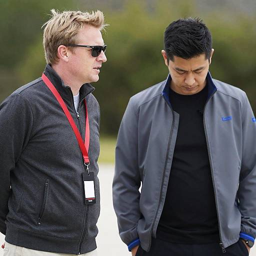 Two Men Conversing Outdoors