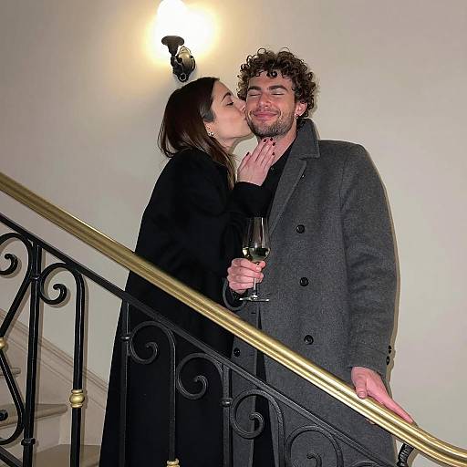 Romantic Staircase Kiss Moment