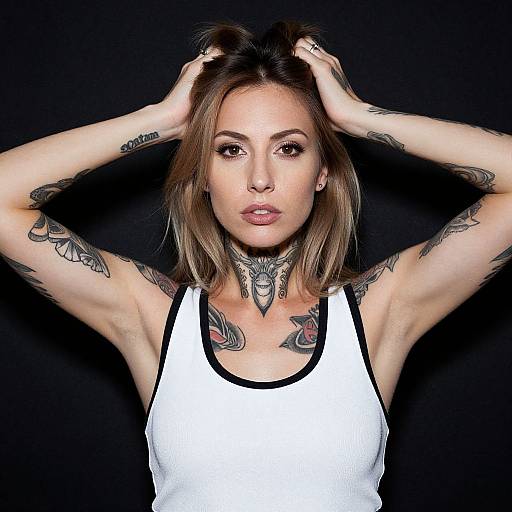Tattooed Woman in White Tank Top
