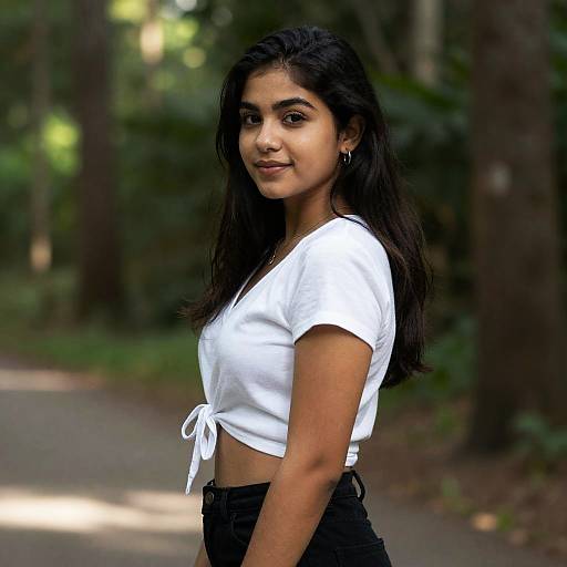 Young Woman in Forest with Sunlight