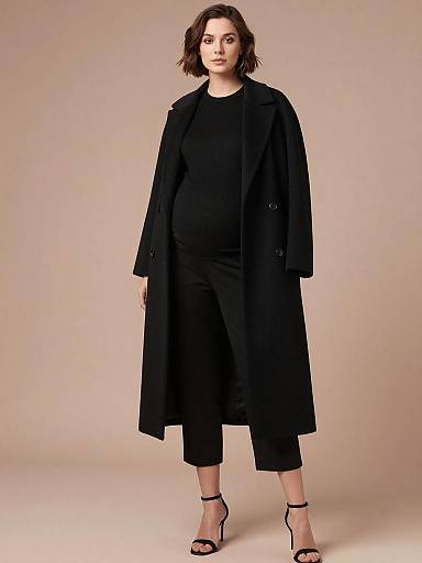 Monochrome High-Fashion Maternity Runway Portrait