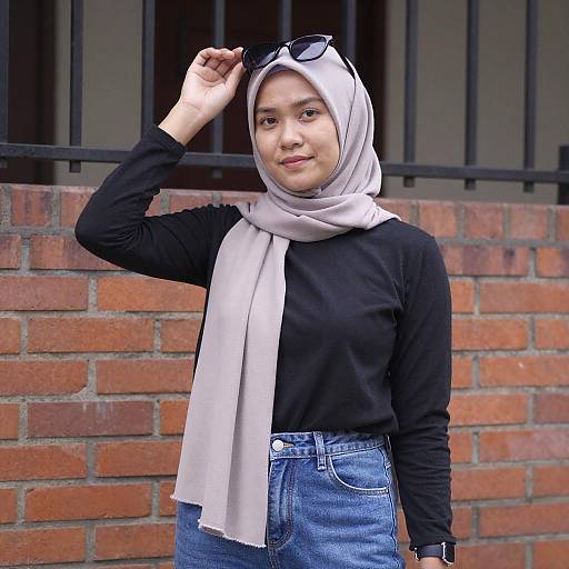 Asian Woman Adjusting Light Purple Hijab