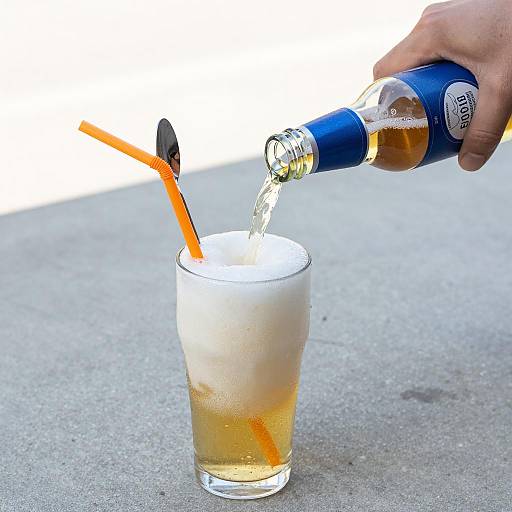 Pouring Beer into Frosted Glass