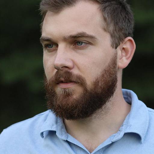 Bearded Man in Light Blue Shirt Outdoors