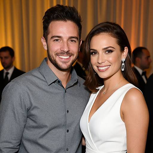 Smiling Couple at Warmly Lit Event