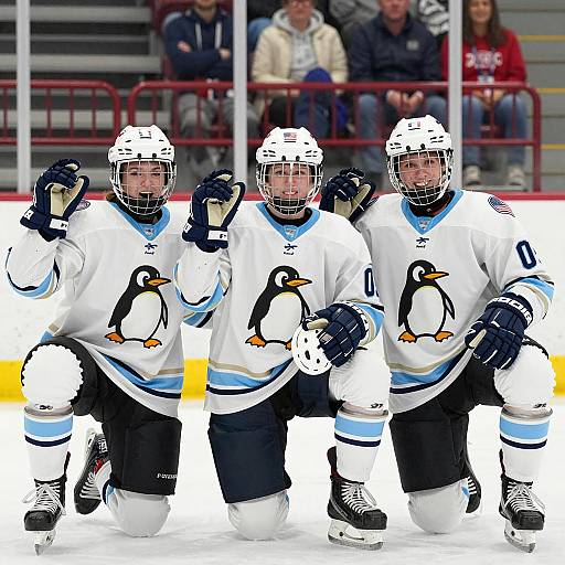 Smiling Female Hockey Players with Penguin