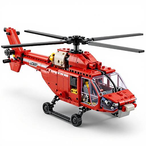 Photograph of a detailed, red LEGO helicopter with black rotor blades, gray cockpit, and yellow accents, set against a white background.