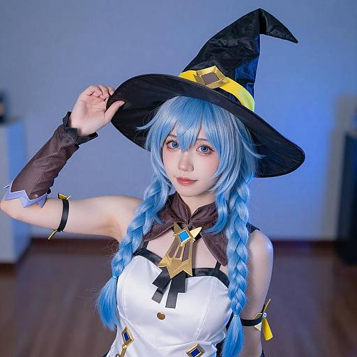 Person with Blue Twin Braids in Witch Hat