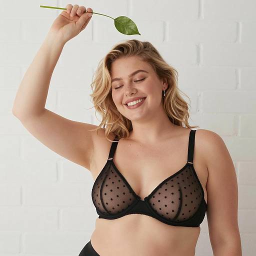 Smiling Woman in Black Sheer Bra with Green Leaf