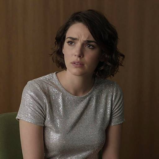 Thoughtful Woman in Sparkly Top Portrait