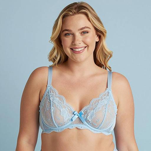 Smiling Blonde Woman in Light Blue Lace Bra