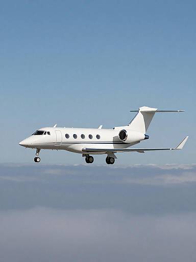 Private Business Jet Flying Above Clouds