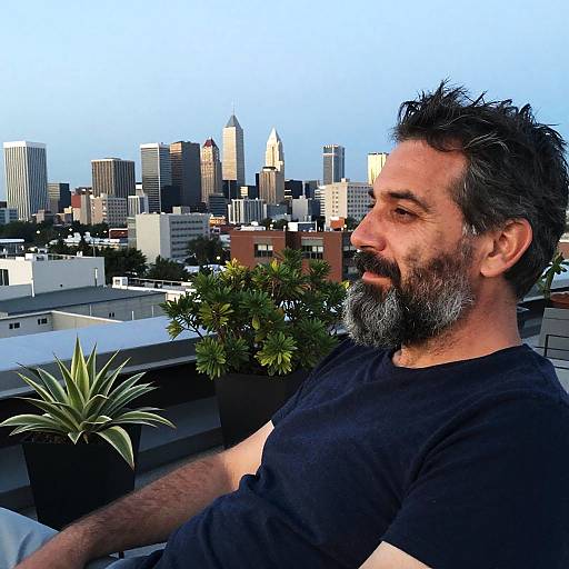 Twilight Rooftop Portrait of Relaxed Man