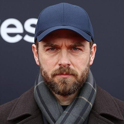 Close-Up Portrait of a Man in Cap