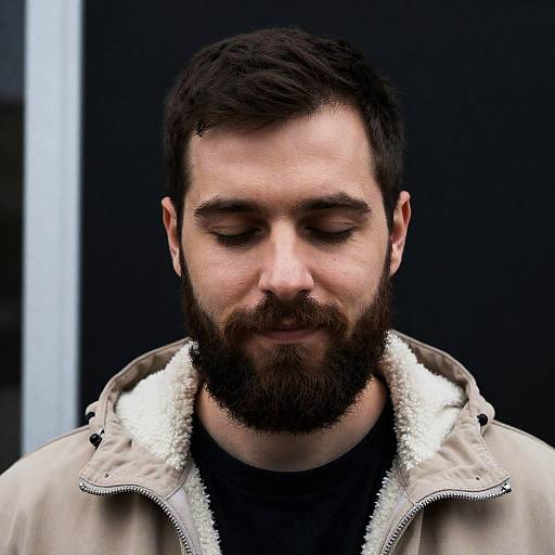 Portrait of a Bearded Man in Hoodie