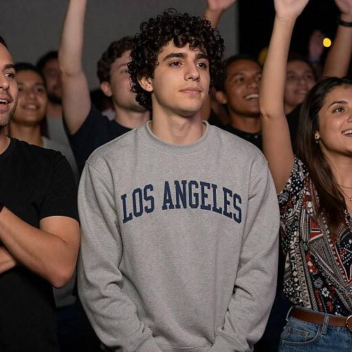 Young Man Cheering in Crowded Scene