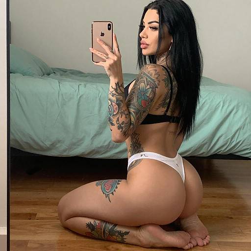 Tattooed Woman Mirror Selfie