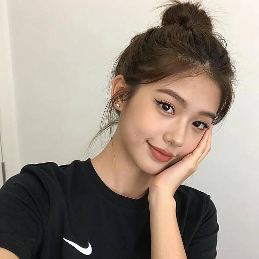 Young Woman Resting Head on Hand