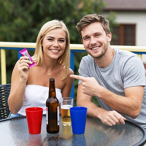 Smiling couple enjoying outdoor gathering