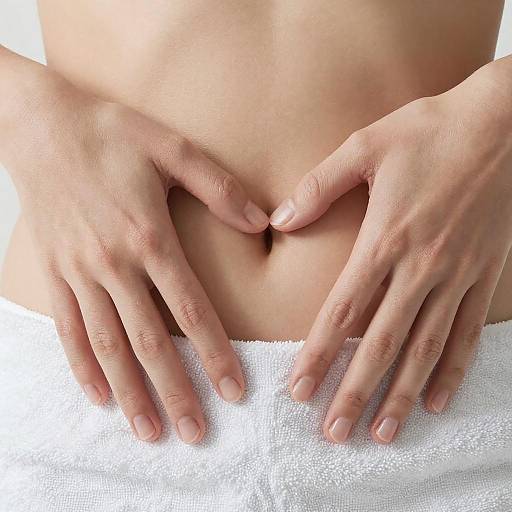 Gentle Hands on a Navel Close-Up