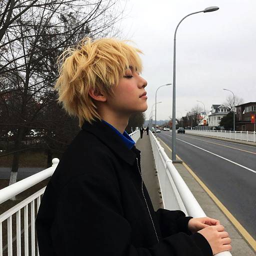 Contemplative Youth on a Scenic Bridge
