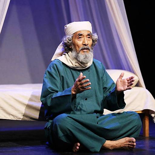 Elderly Man in Dimly Lit Room