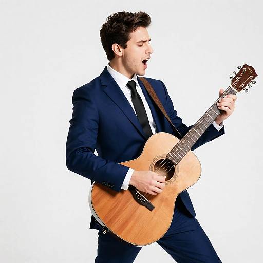 Dynamic Guitarist in Elegant Blue Suit