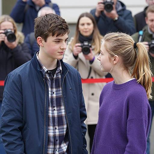 Teenagers Talking in Crowded Outdoor Setting