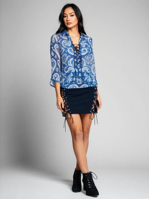Woman in Blue Paisley Blouse and Black Mini Skirt