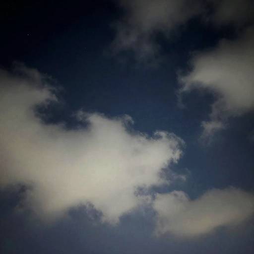 Night Sky with Clouds and Stars