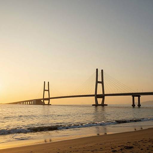 Sunset Bridge Over Tranquil Sea
