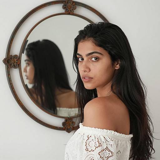 Young Woman in Lace Top by Mirror