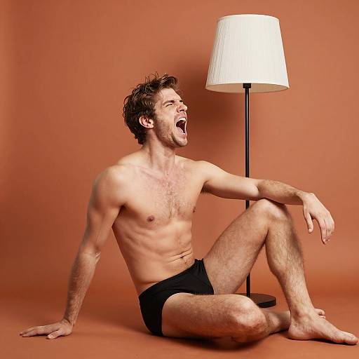 Shirtless Man Yelling in Abstract Space