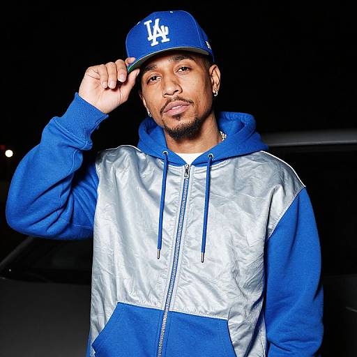 Rapper in Blue and Silver Hoodie