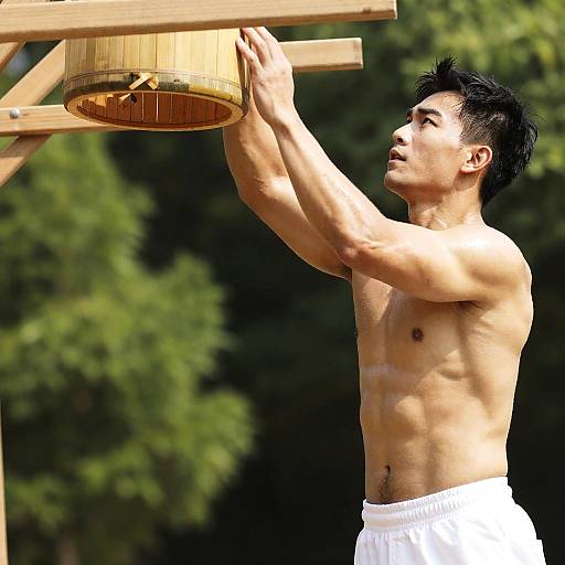 Focused Muscular Man Under Sunlight