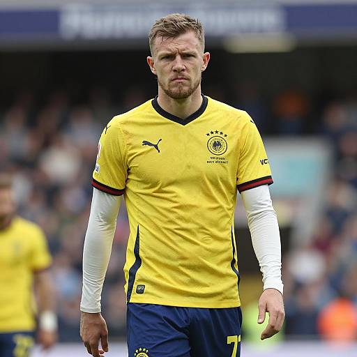 Male Soccer Player in Yellow Germany Jersey