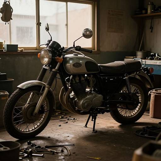 Vintage Motorcycle Repair in Garage